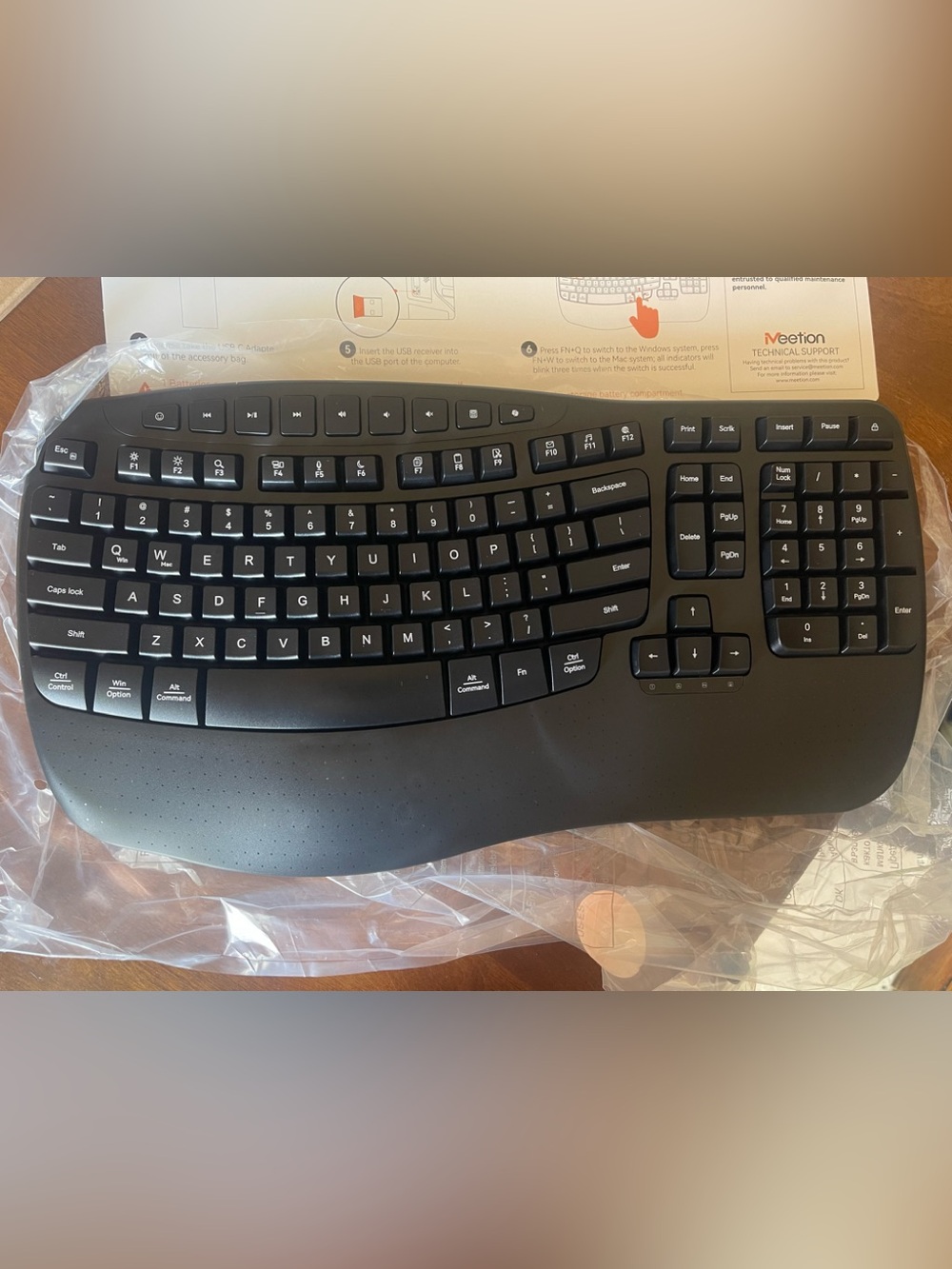 New in Box Meetion Wireless Ergonomic Wave Keyboard Built in Wrist Wave Keys